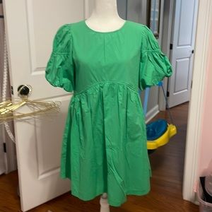 Green dresses brand new with tags. $25